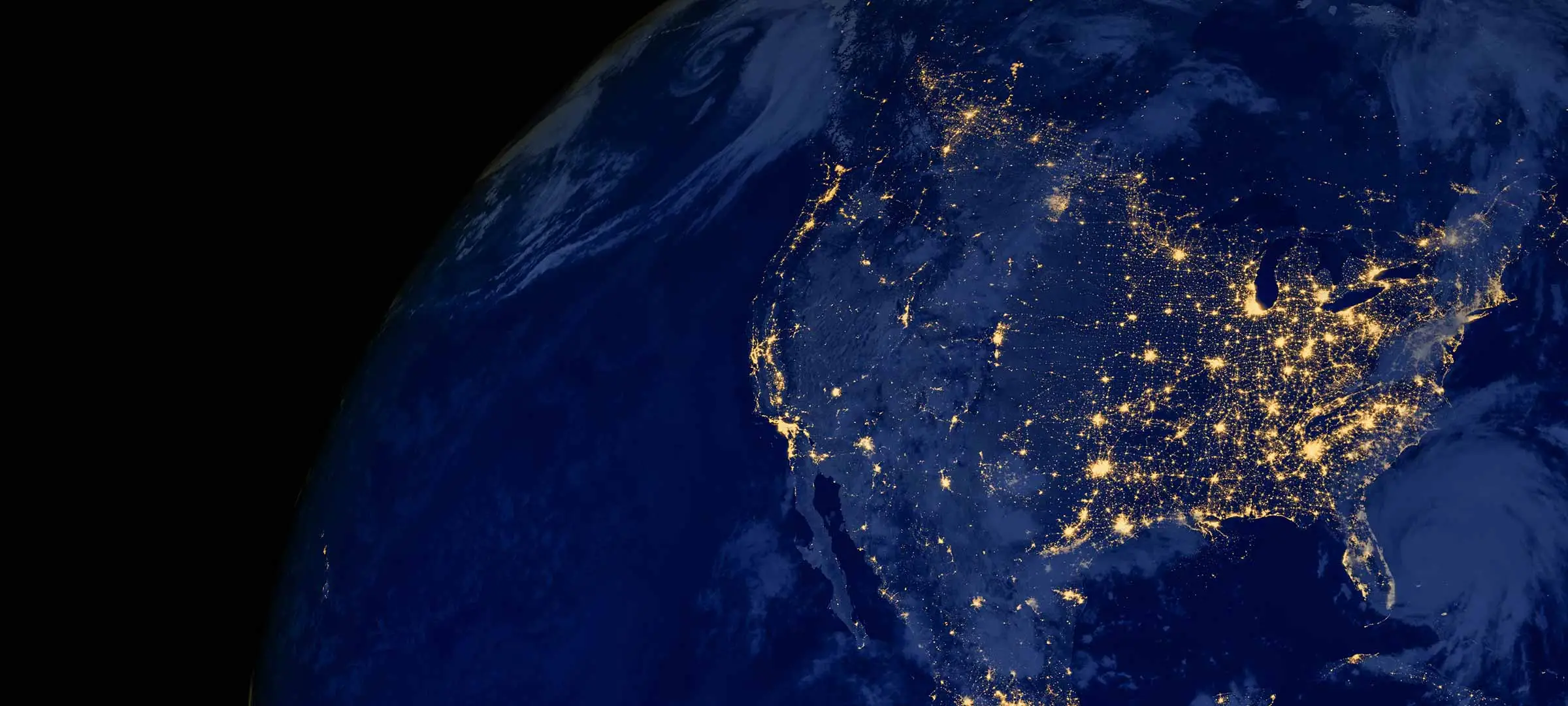 Image of the United States at night from space.